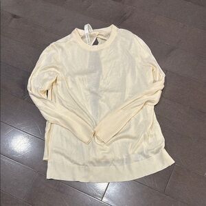 Lululemon Sz 8 Cream Women's light sweater with open back.  Worn once EUC